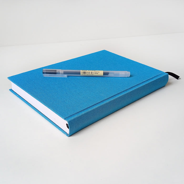 BLUE HARDCOVER NOTEBOOK