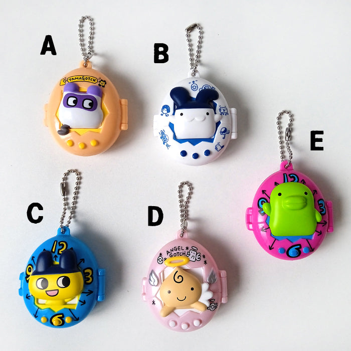 TAMAGOTCHI PILL BOX KEYCHAINS
