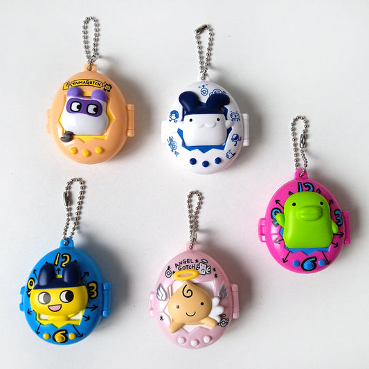 TAMAGOTCHI PILL BOX KEYCHAINS
