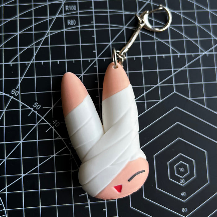 INJURED RABBIT KEYCHAIN – MEWGODOW